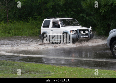 Jeeps in floods Stock Photo