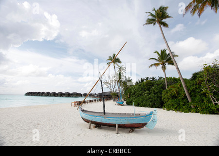 Old boat on the beach at Irufushi, Hilton Worldwide Resorts, Noonu Atoll, Maldives, Indian Ocean Stock Photo