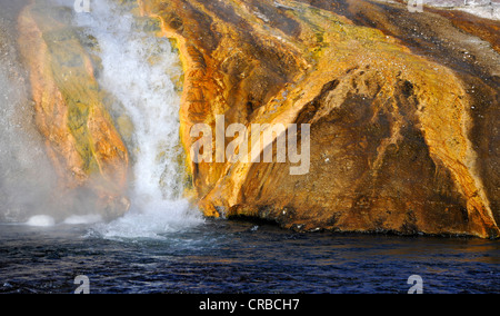 Outlet of the Excelsior Geyser in Firehole River, Midway Geyser Basin, colourful thermophilic bacteria, microorganisms, geysers Stock Photo