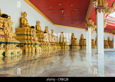 Golden statues of Buddha in a mountain temple, Wat Bang Riang temple, Thub Pat, Phang Nga, Thailand, Southeast Asia Stock Photo