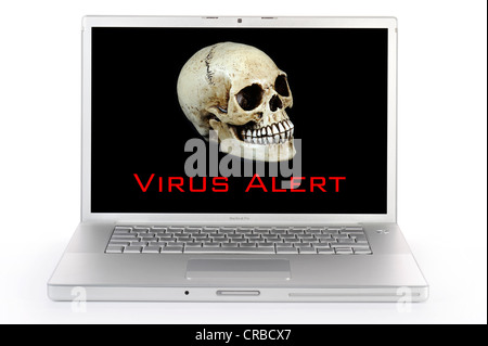 Laptop computer, skull, lettering 'Virus Alert', symbolic image Stock Photo