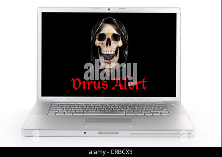 Laptop computer, skull, lettering 'Virus Alert', symbolic image Stock Photo