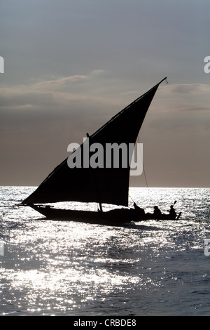 Arab dhow off the coast of Stone Town, Zanzibar, Tanzania, Africa Stock Photo