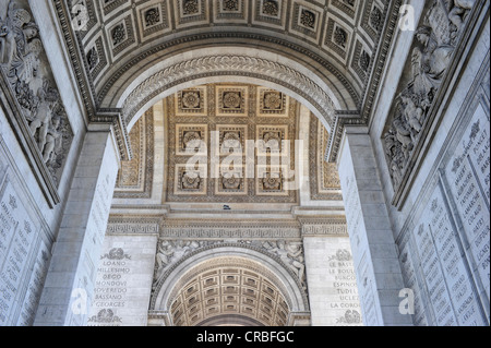 Reliefs, names, and inscriptions, Arc de Triomphe triumphal arch from below, Place Charles de Gaulle, historic axis, Paris Stock Photo