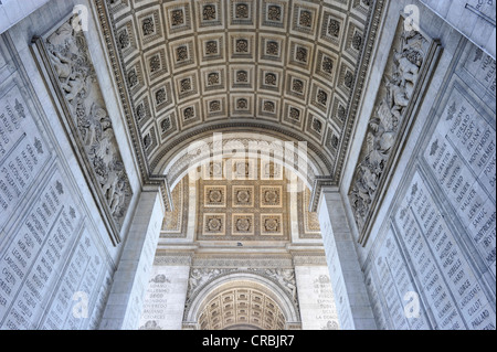 Frog perspective view of wall reliefs with names and inscriptions, Arc de Triomphe, Place Charles-de-Gaulle, Axe historique Stock Photo