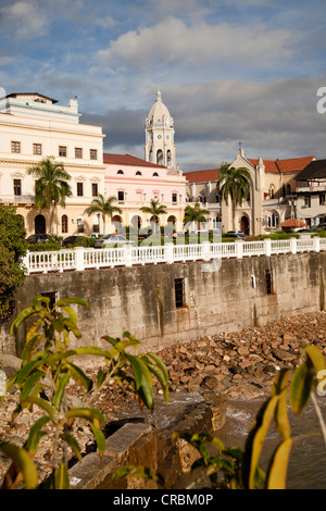 Bell tower of the Iglesia de San Francisco Church and the building of the national theatre, Teatro Nacional, in the Old City Stock Photo