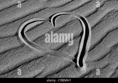Heart drawn in the sand of the Mesquite Flat Sand Dunes, Stovepipe Wells, Death Valley National Park, Mojave-Desert, California
