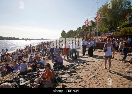 Crowded beach bar at the river Elbe shore in Oevelgoenne, Hanseatic City of Hamburg, Germany, Europe Stock Photo