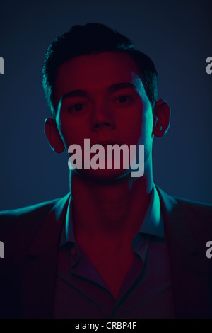 Close up of mans serious face Stock Photo