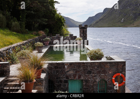 Pool and boathouse on Lough Veagh, Glenveagh Castle and Gardens, Glenveagh National Park, County Donegal, Ireland, Europe Stock Photo