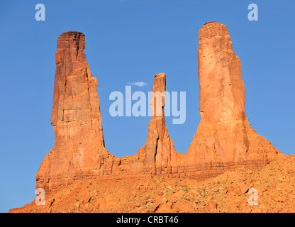 Three Sisters Pinnacles, rock formation in Monument Valley, Navajo Tribal Park, Navajo Nation Reservation, Arizona, Utah Stock Photo