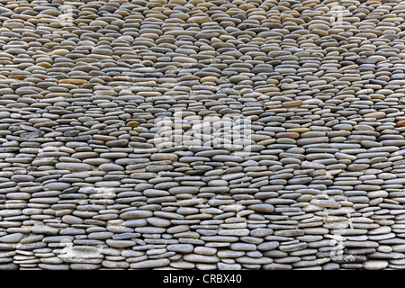 Wall made of pebbles, Bali, Indonesia, Southeast Asia Stock Photo