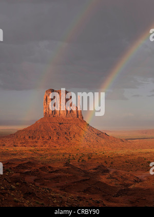 Double rainbow after a thunderstorm in the evening light, mesa, West Mitten Butte, Monument Valley, Navajo Tribal Park Stock Photo
