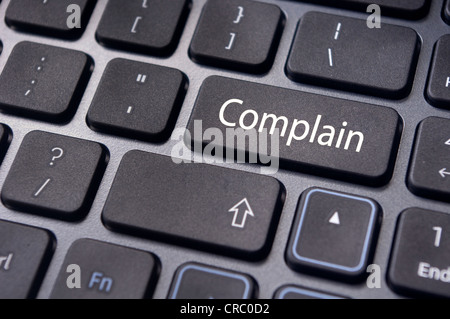 to illustrate poor customer service, with complain message on keyboard. Stock Photo