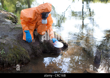 Expert analysis of radioactive water Stock Photo