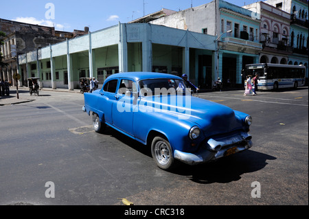 Blue 1950s vintage car on the Avenida Simon Bolivar, Calle Reina, city centre of Havana, Centro Habana, Cuba, Greater Antilles Stock Photo