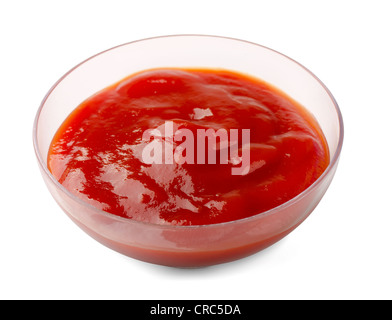 Sauce cup of ketchup isolated on white Stock Photo