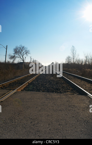 Train tracks in rural landscape Stock Photo