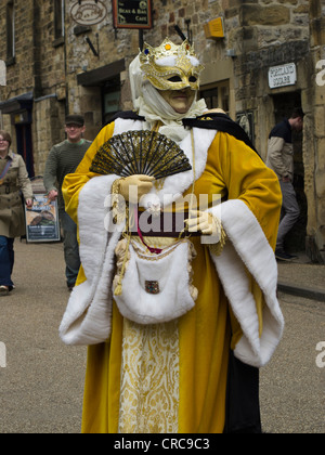 people dressed in medieval clothing as living history characters in the Derbyshire town of Bakewell Derbyshire England Stock Photo