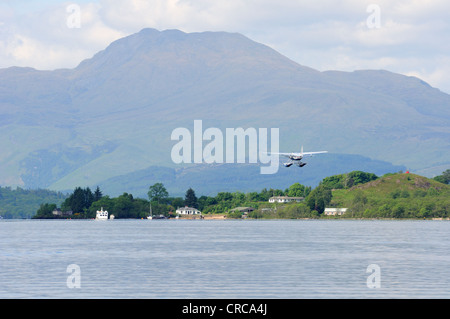 Sea plane taking off from Loch Lomond in Argyll, Scotland. Stock Photo