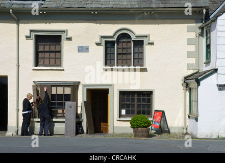 Putting up the shutters: the Beatrix Potter Galley in the village of Hawkshead, Lake District National Park, Cumbria, England UK Stock Photo