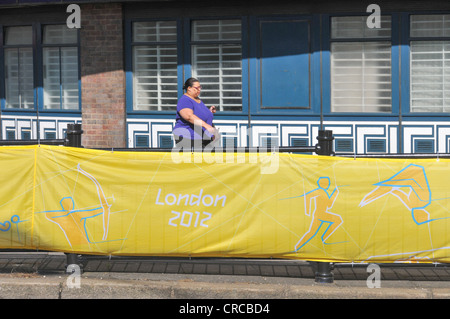 London 2012 Olympic Torch Route, Southgate Enfield. Banners and signs along High Street, Southgate Stock Photo