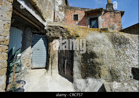 Winding alley with stairways and passages, medieval town of Vecchia Calcata, valley of Valle del Treja, Lazio, Italy, Europe Stock Photo