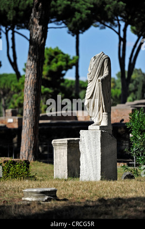 Ancient statue at the Temple of Ceres, Piazzale delle Corporazioni, Square of the Guilds or Corporations Stock Photo