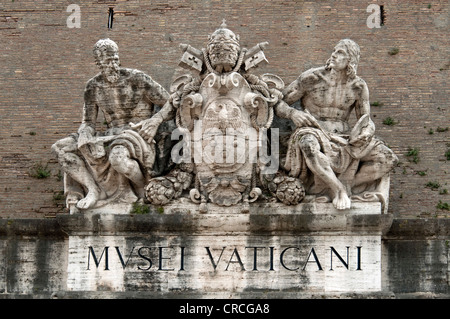 Statues of saints on the coat of arms of Pope Pius XI, portal to the Vatican Museums, Vatican Walls, Vatican City, Rome, Lazio Stock Photo