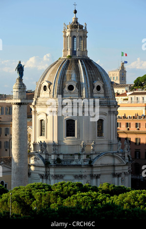 Trajan's Column with a bronze statue of the apostle Peter, Church Santissimo Nome di Maria al Foro Traiano or Church of the Most Stock Photo