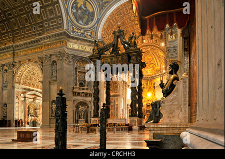 St. Peter's baldachin, Bernini's baldachin above the papal altar and a statue of Saint Peter, attributed to Arnolfo di Cambio Stock Photo