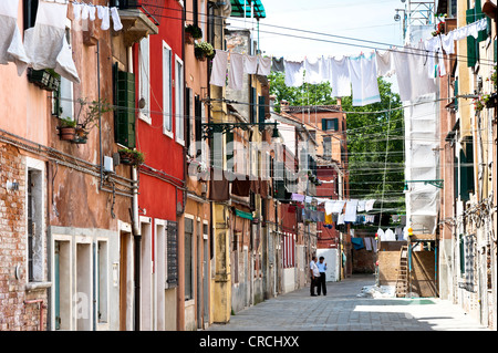Laundry drying on clotheslines stretched across the street, Castello, Venice, Italy, Europe Stock Photo