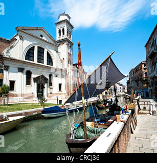 Flea market on a boat at the Church of San Trovaso, Sestiere Dorsoduro district, Venice, Italy, Europe Stock Photo