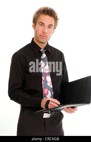 young businessman reflecting, making some notes Stock Photo