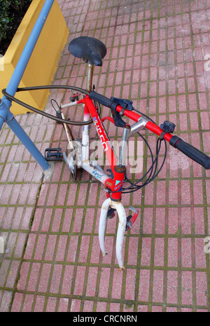 locked bicycle frame, stolen wheels, Spain, Majorca