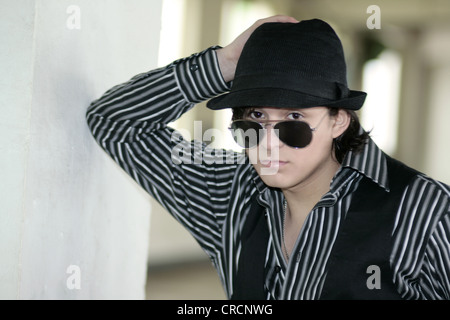young man with hat and sunglasses, Germany Stock Photo