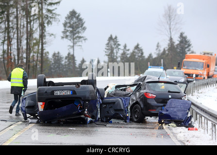 Two totally destroyed cars after a fatal accident on a federal highway, Bundesstrasse 327, during icy road conditions, Buchholz Stock Photo