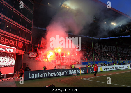 Cologne fans have ignited fireworks, Bundesliga football league, 1. FC Kaiserslautern - 1. FC Cologne, Fritz-Walter-Stadium Stock Photo