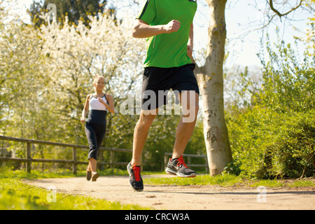 Young couple jogging Stock Photo