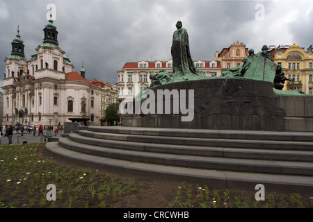 The monument to Jan Hus in Prague in a rainy cloudy day Stock Photo