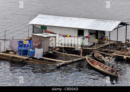 Typical floating home in the Amazon, city of Tefe near Manaus, Amazonas province, Brazil, South America Stock Photo