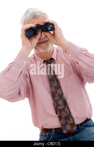 retiree with spyglass Stock Photo