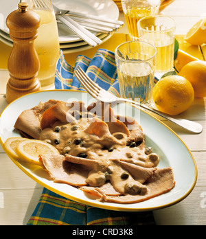 Vitello Tonnato, specialty from Piedmont, tender veal cooked in white wine with a creamy tuna caper sauce, cold starter, Italy Stock Photo