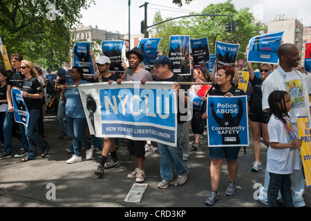 Thousands of demonstrators march down Fifth Avenue in New York for a silent march protesting the NYPD policy of stop and frisk Stock Photo