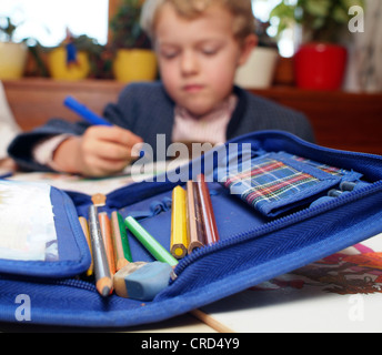 schoolboy doing homework Stock Photo