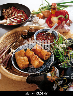 Deep fried pancake parcels filled with spicy minced beef, Indonesia. Stock Photo