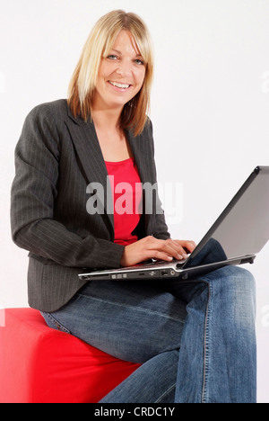 young business woman using laptop Stock Photo