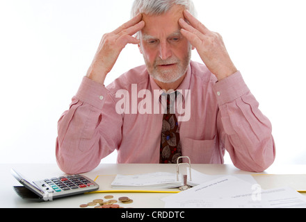 desperated man watching his statements of account Stock Photo