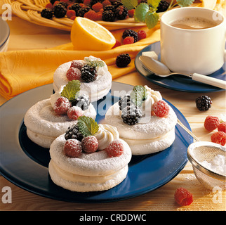Meringue with lemon curd and berries, Sweden. Stock Photo