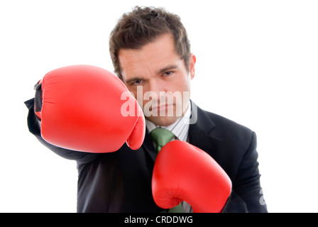 young businesmann with boxing gloves Stock Photo